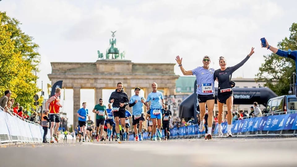 runners completing the berlin marathon