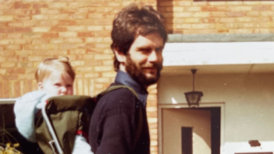 Kate as a baby with her dad