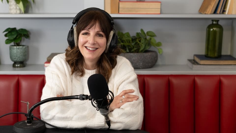 storyteller penny bell in podcast recording studio