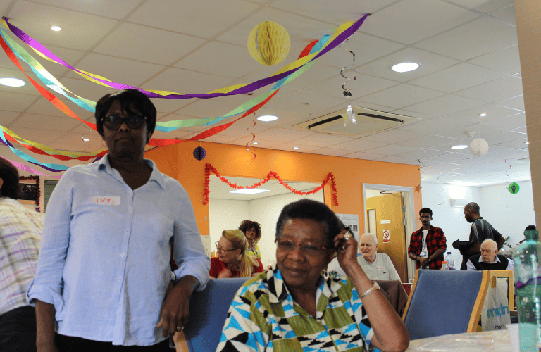 Carers and people with dementia celebrating the 10th birthday for Tom’s Club in August 2019.