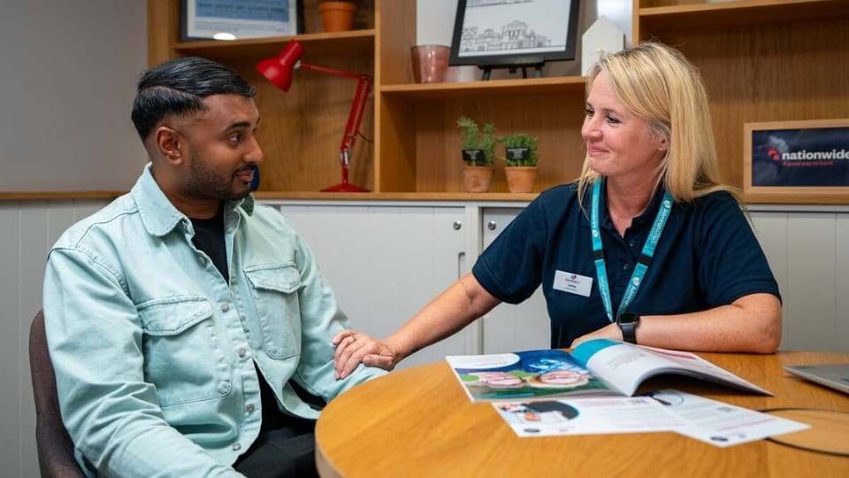 Nationwide Branch Admiral Nurse Clinic featuring Lesley Potter (Dementia UK Admiral Nurse) and a volunteer model posing as the public (Kashem Chowdhury, Nationwide staff)