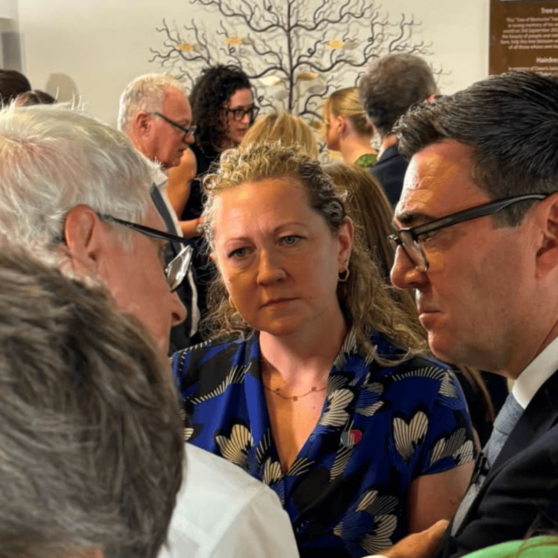 Dementia UK campaigner, Clare, speaking with the Prime Minister, Andy Burnham