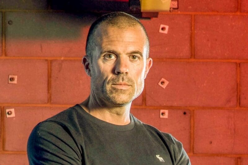 Mark Cananur, man looking at camera