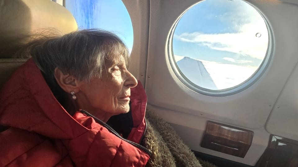 Jules' mum on a her final flight looking out the window